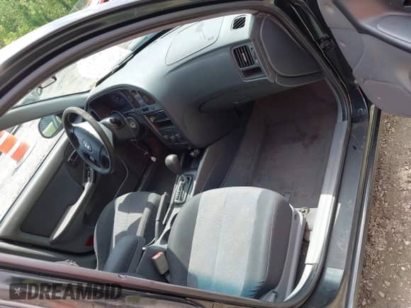 2005 Hyundai Elantra GLS z VIN KMHDN56D85U174761, wystawiony jako IAAI lot #42278313 z przebiegiem 168 242 mil mil oraz . Historia ofert i sprzedaży dostępna na DreamBid. Obrazek 5.