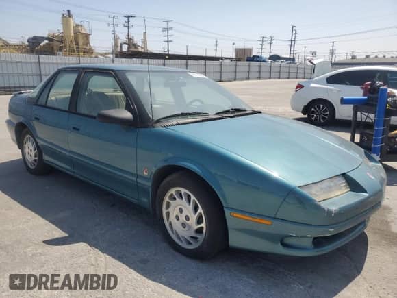 1994 Saturn SL с VIN 1G8ZK5571RZ301061, выставлен на аукционе Copart как лот 55270685 с пробегом 31 990 миль миль и Чистый • Clean title. История ставок и продаж доступна на DreamBid. Изображение 4.