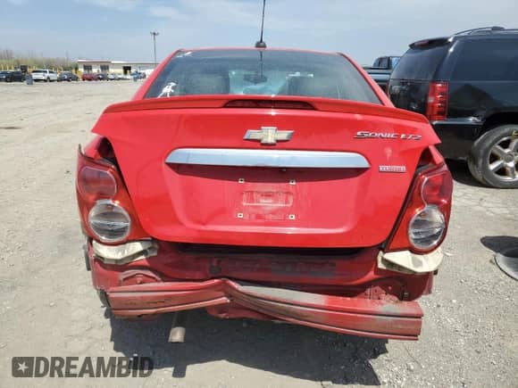 2015 Chevrolet Sonic LTZ с VIN 1G1JE5SB0F4203370, выставлен на аукционе Copart как лот 53813565 с пробегом 139 873 миль миль и Чистый • Clean title. История ставок и продаж доступна на DreamBid. Изображение 6.