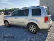 2010 Honda Pilot Touring with VIN 5FNYF4H92AB014464, listed as a Copart auction lot 69681105 with 232,769 mi miles and Clean title. Bid and sale history available at DreamBid. Image 2.