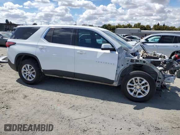 2023 Chevrolet Traverse LS with VIN 1GNEVFKW7PJ129795, listed as a Copart auction lot 72059065 with 60,416 mi miles and Salvage title. Bid and sale history available at DreamBid. Image 4.