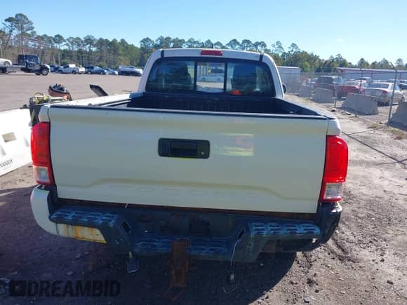 2016 Toyota Tacoma SR with VIN 5TFRX5GN4GX058969, listed as a IAAI auction lot 43590771 with 237,437 mi miles and . Bid and sale history available at DreamBid. Image 16.