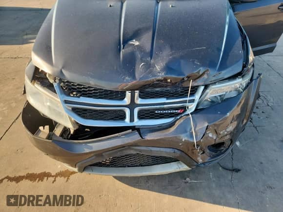 2017 Dodge Journey SXT with VIN 3C4PDCBG7HT589514, listed as a Copart auction lot 80213035 with 147,824 mi miles and Salvage title. Bid and sale history available at DreamBid. Image 12.