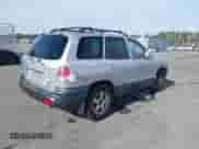 2002 Hyundai Santa Fe GLS with VIN KM8SC13D42U202223, listed as a IAAI auction lot 41338701 with 228,620 mi miles and . Bid and sale history available at DreamBid. Image 4.