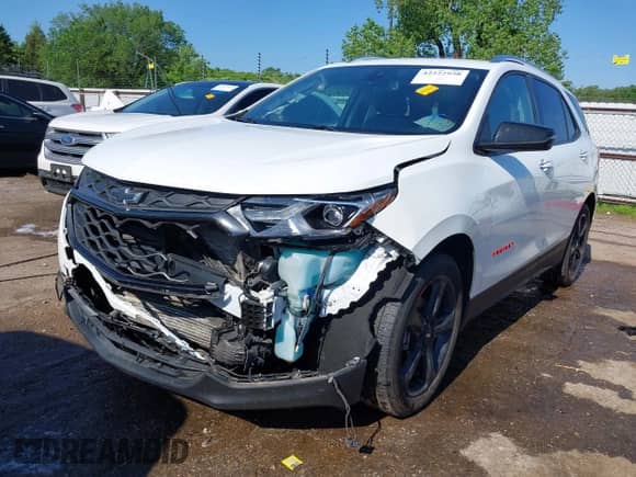 2021 Chevrolet Equinox Premier with VIN 2GNAXNEV9M6120241, listed as a IAAI auction lot 42222928 with 104,274 mi miles and . Bid and sale history available at DreamBid. Image 2.