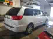 2008 Toyota Sienna XLE с VIN 5TDZK22C88S160415, выставлен на аукционе Copart как лот 81640795 с пробегом 270 415 миль миль и Списание • Salvage title. История ставок и продаж доступна на DreamBid. Изображение 3.