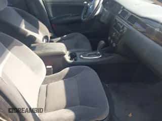 2013 Chevrolet Impala LS z VIN 2G1WF5E33D1216565, wystawiony jako IAAI lot #43547513 z przebiegiem 150 362 mil mil oraz . Historia ofert i sprzedaży dostępna na DreamBid. Obrazek 5.