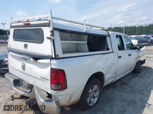 2015 Ram 1500 ST with VIN 1C6RR7FT9FS669797, listed as a IAAI auction lot 43061981 with 170,184 mi miles and . Bid and sale history available at DreamBid. Image 4.