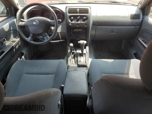 2003 Nissan Frontier SVE with VIN 1N6MD29Y43C411380, listed as a Copart auction lot 64013085 with 95,252 mi miles and Salvage title. Bid and sale history available at DreamBid. Image 8.