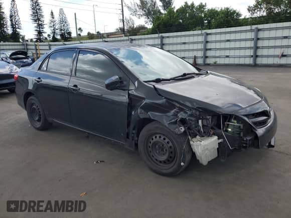 2011 Toyota Corolla L with VIN 2T1BU4EE8BC687164, listed as a Copart auction lot 67632375 with 205,527 mi miles and Salvage title. Bid and sale history available at DreamBid. Image 4.