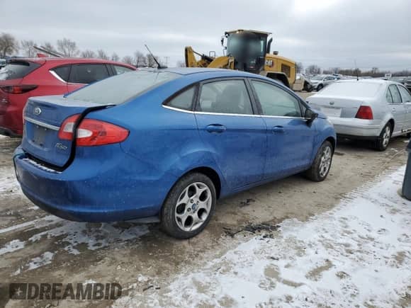 2011 Ford Fiesta SEL with VIN 3FADP4CJ5BM207286, listed as a Copart auction lot 82871614 with 106,545 mi miles and Salvage title. Bid and sale history available at DreamBid. Image 3.