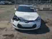 2012 Hyundai Veloster w/Red Int z VIN KMHTC6AD5CU058901, wystawiony jako Copart lot #69244165 z przebiegiem 97 260 mil mil oraz Szkoda całkowita • Salvage title. Historia ofert i sprzedaży dostępna na DreamBid. Obrazek 5.