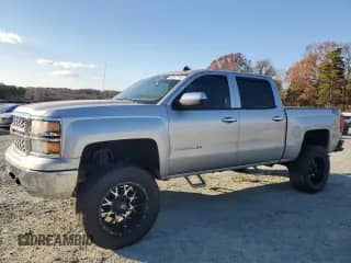 2014 Chevrolet Silverado 1500 LT with VIN 3GCUKREHXEG371376, listed as a Copart auction lot 82847144 with 182,782 mi miles and Salvage title. Bid and sale history available at DreamBid. Image 1.
