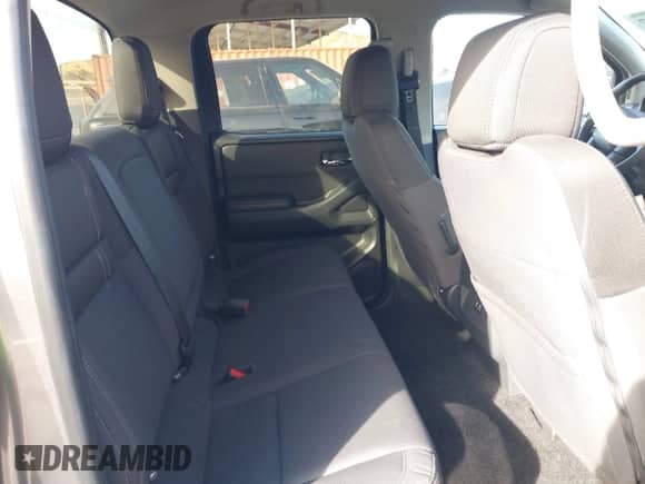 2023 Nissan Frontier SV with VIN 1N6ED1EJXPN659912, listed as a IAAI auction lot 41393027 with 20,745 mi miles and . Bid and sale history available at DreamBid. Image 8.