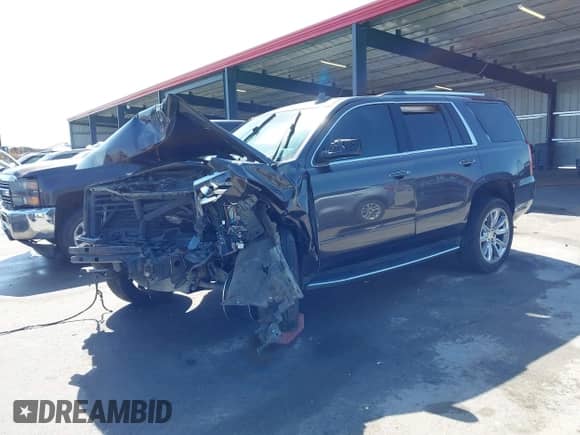 2017 Chevrolet Tahoe Premier with VIN 1GNSKCKC2HR305848, listed as a IAAI auction lot 42809925 with 105,623 mi miles and . Bid and sale history available at DreamBid. Image 2.