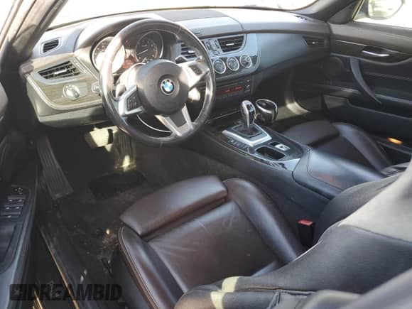 2013 BMW Z4 sDrive28i with VIN WBALL5C50DJ103778, listed as a Copart auction lot 49452215 with 104,203 mi miles and Salvage title. Bid and sale history available at DreamBid. Image 8.