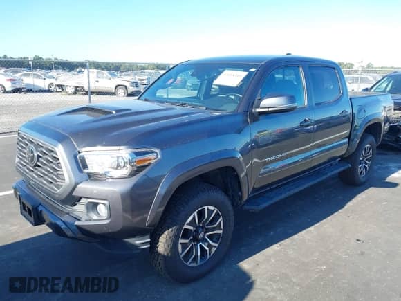 2020 Toyota Tacoma SR5 with VIN 3TMCZ5AN8LM296929, listed as a IAAI auction lot 43118349 with 68,020 mi miles and . Bid and sale history available at DreamBid. Image 2.