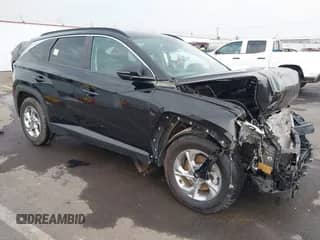 2022 Hyundai Tucson SEL z VIN 5NMJBCAE9NH034164, wystawiony jako IAAI lot #43119713 z przebiegiem Nie podano mil oraz . Historia ofert i sprzedaży dostępna na DreamBid. Obrazek 1.