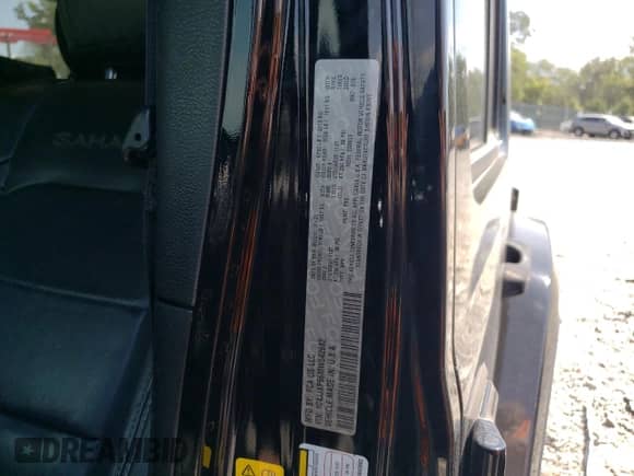 2021 Jeep Wrangler Unlimited Sahara with VIN 1C4JJXP66MW642682, listed as a Copart auction lot 80336735 with 55,596 mi miles and Salvage title. Bid and sale history available at DreamBid. Image 14.