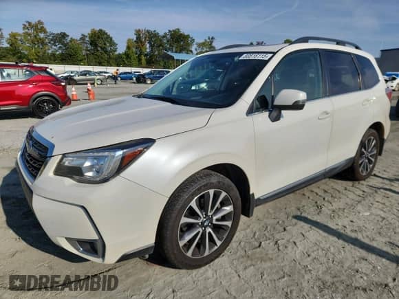 2017 Subaru Forester Touring z VIN JF2SJGWCXHH542608, wystawiony jako Copart lot #80816115 z przebiegiem 147 233 mil mil oraz Szkoda całkowita • Salvage title. Historia ofert i sprzedaży dostępna na DreamBid. Obrazek 1.