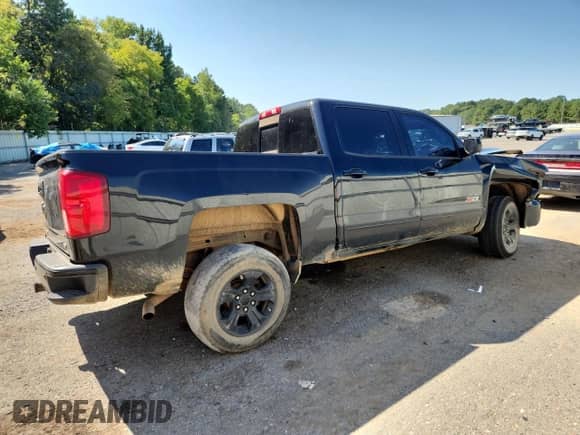 2018 Chevrolet Silverado 1500 LTZ с VIN 3GCUKSEC0JG195220, выставлен на аукционе Copart как лот 71734315 с пробегом 131 425 миль миль и Списание • Salvage title. История ставок и продаж доступна на DreamBid. Изображение 3.