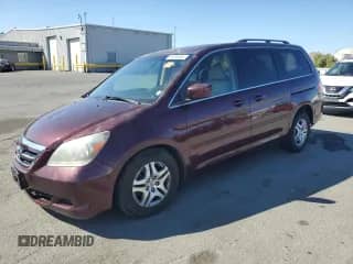 2007 Honda Odyssey EX-L z VIN 5FNRL38677B426367, wystawiony jako Copart lot #81696385 z przebiegiem 146 391 mil mil oraz Szkoda całkowita • Salvage title. Historia ofert i sprzedaży dostępna na DreamBid. Obrazek 1.