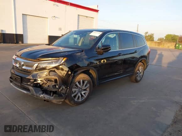 2022 Honda Pilot EX-L z VIN 5FNYF5H56NB036086, wystawiony jako IAAI lot #41657794 z przebiegiem 38 627 mil mil oraz . Historia ofert i sprzedaży dostępna na DreamBid. Obrazek 2.