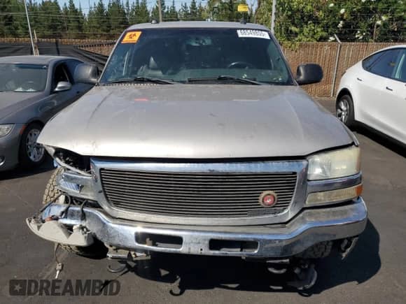 2004 GMC Sierra 1500 SLE z VIN 2GTEC19T941124598, wystawiony jako Copart lot #68549855 z przebiegiem Nie podano mil oraz Szkoda całkowita • Salvage title. Historia ofert i sprzedaży dostępna na DreamBid. Obrazek 5.