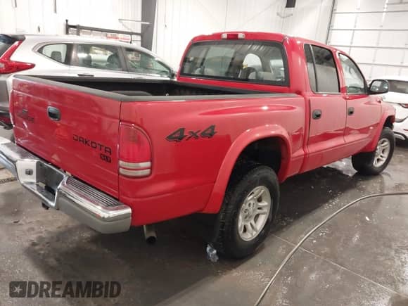 2004 Dodge Dakota SLT with VIN 1D7HG48N44S733366, listed as a IAAI auction lot 42319470 with 156,798 mi miles and . Bid and sale history available at DreamBid. Image 4.