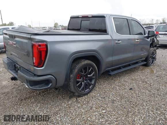 2020 GMC Sierra 1500 Denali with VIN 3GTU9FET9LG260281, listed as a IAAI auction lot 43275873 with 130,770 mi miles and . Bid and sale history available at DreamBid. Image 4.