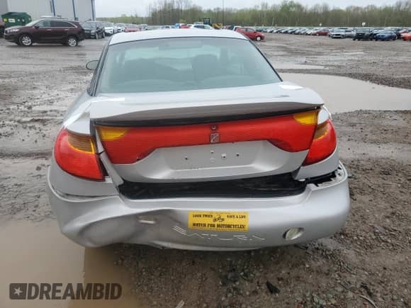 2001 Saturn SC с VIN 1G8ZR14721Z291764, выставлен на аукционе Copart как лот 55414785 с пробегом 215 943 миль миль и Списание • Salvage title. История ставок и продаж доступна на DreamBid. Изображение 6.