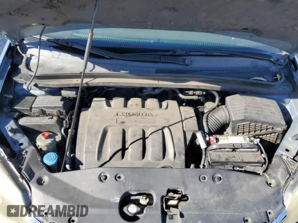 2005 Honda Odyssey EX z VIN 5FNRL38445B079706, wystawiony jako Copart lot #85196605 z przebiegiem 243 000 mil mil oraz Szkoda całkowita • Salvage title. Historia ofert i sprzedaży dostępna na DreamBid. Obrazek 12.