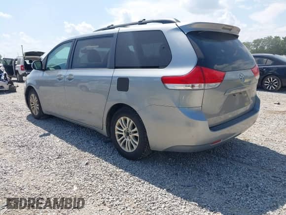 2011 Toyota Sienna XLE AAS with VIN 5TDYK3DC8BS146813, listed as a IAAI auction lot 42982003 with 441,565 mi miles and . Bid and sale history available at DreamBid. Image 3.