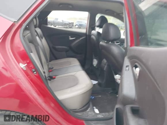 2013 Hyundai Tucson Limited с VIN KM8JUCAC4DU622369, выставлен на аукционе IAAI как лот 42755740 с пробегом 94 877 миль миль и . История ставок и продаж доступна на DreamBid. Изображение 8.