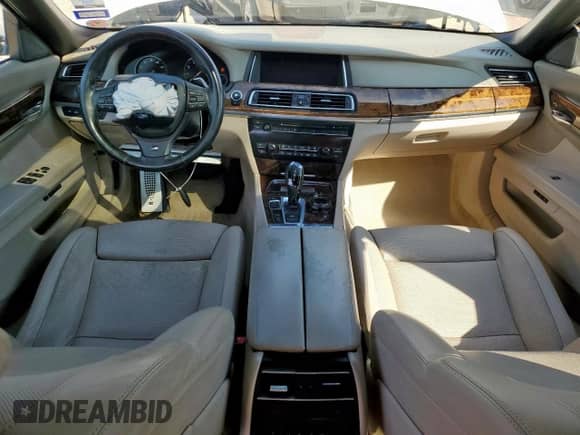 2015 BMW 7 Series 750i с VIN WBAYA8C51FG197604, выставлен на аукционе Copart как лот 71919285 с пробегом 165 914 миль миль и Списание • Salvage title. История ставок и продаж доступна на DreamBid. Изображение 8.