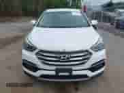 2017 Hyundai Santa Fe 2.4L z VIN 5XYZTDLB0HG393894, wystawiony jako IAAI lot #42744520 z przebiegiem 81 644 mil mil oraz . Historia ofert i sprzedaży dostępna na DreamBid. Obrazek 6.