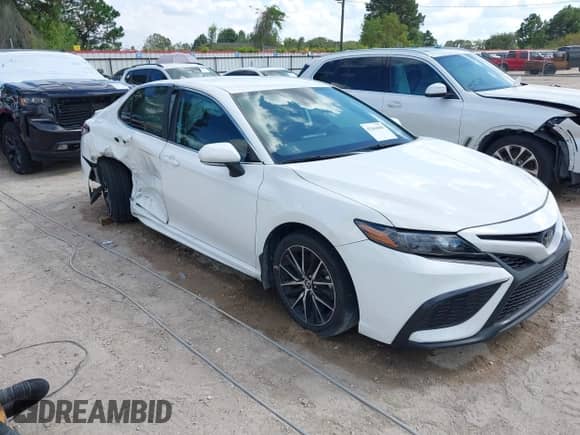 2023 Toyota Camry SE with VIN 4T1G11AKXPU755740, listed as a IAAI auction lot 43464689 with 35,445 mi miles and . Bid and sale history available at DreamBid. Image 1.