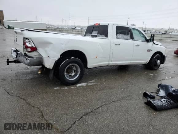 2010 Dodge 3500 Laramie с VIN 3D73M4CL1AG136574, выставлен на аукционе Copart как лот 45725105 с пробегом 280 028 миль миль и Списание • Salvage title. История ставок и продаж доступна на DreamBid. Изображение 3.