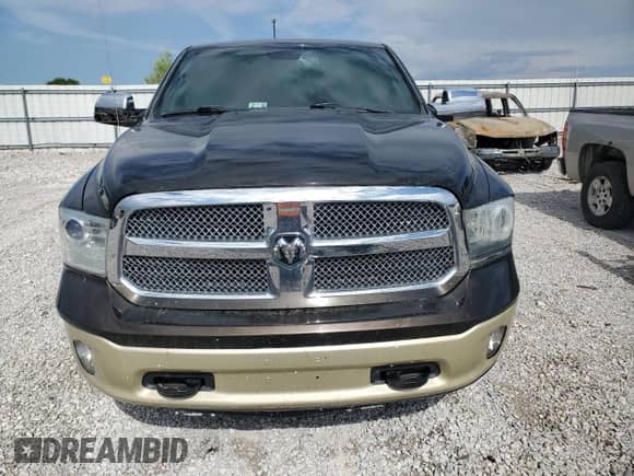 2013 Ram 1500 Limited z VIN 1C6RR7WT0DS711366, wystawiony jako Copart lot #70709985 z przebiegiem Nie podano mil oraz Szkoda całkowita • Salvage title. Historia ofert i sprzedaży dostępna na DreamBid. Obrazek 5.