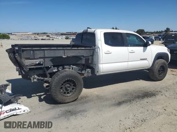 2019 Toyota Tacoma SR5 с VIN 3TMDZ5BN6KM058580, выставлен на аукционе Copart как лот 65633265 с пробегом 30 232 миль миль и Списание • Salvage title. История ставок и продаж доступна на DreamBid. Изображение 3.