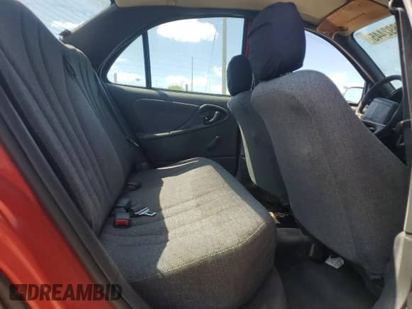 2001 Chevrolet Cavalier z VIN 1G1JC524517158151, wystawiony jako Copart lot #70892445 z przebiegiem 153 409 mil mil oraz Szkoda całkowita • Salvage title. Historia ofert i sprzedaży dostępna na DreamBid. Obrazek 10.