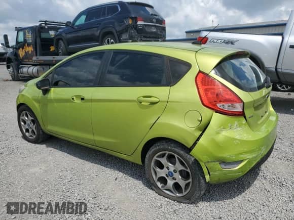 2012 Ford Fiesta SES with VIN 3FADP4FJ2CM103917, listed as a Copart auction lot 64542735 with 215,504 mi miles and Salvage title. Bid and sale history available at DreamBid. Image 2.
