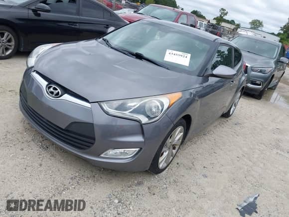 2017 Hyundai Veloster Value Edition z VIN KMHTC6AD7HU308551, wystawiony jako IAAI lot #43455924 z przebiegiem 161 989 mil mil oraz . Historia ofert i sprzedaży dostępna na DreamBid. Obrazek 2.