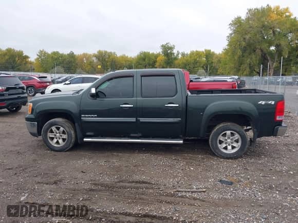 2013 GMC Sierra 1500 SLE z VIN 3GTP2VE75DG231117, wystawiony jako IAAI lot #43475156 z przebiegiem 99 209 mil mil oraz . Historia ofert i sprzedaży dostępna na DreamBid. Obrazek 14.