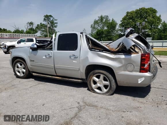 2010 Chevrolet Suburban LS с VIN 1GNUCHE02AR266754, выставлен на аукционе Copart как лот 56241955 с пробегом Не указан миль и Списание • Salvage title. История ставок и продаж доступна на DreamBid. Изображение 2.