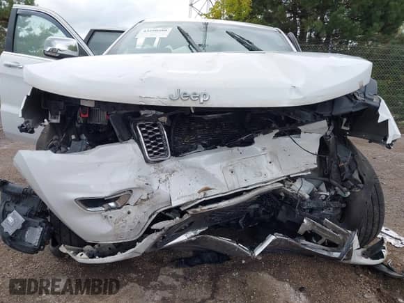 2017 Jeep Grand Cherokee Overland with VIN 1C4RJFCG8HC663780, listed as a IAAI auction lot 43290580 with 105,136 mi miles and . Bid and sale history available at DreamBid. Image 6.