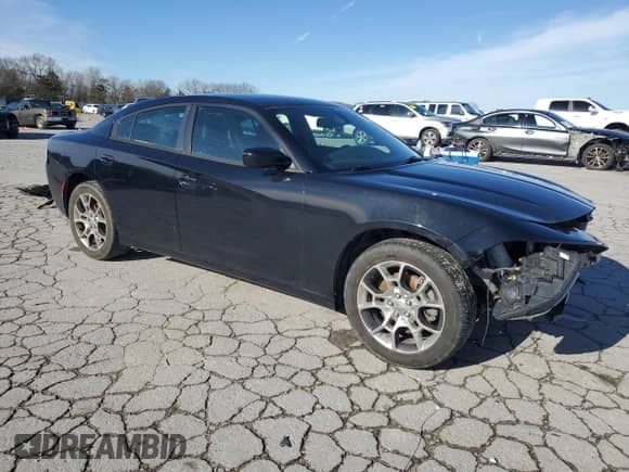 2015 Dodge Charger SE with VIN 2C3CDXFG2FH810382, listed as a Copart auction lot 49822875 with 133,834 mi miles and Clean title. Bid and sale history available at DreamBid. Image 4.