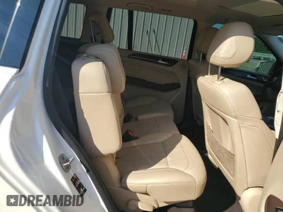 2018 Mercedes-Benz GLS 450 с VIN 4JGDF6EE1JB091093, выставлен на аукционе Copart как лот 69944925 с пробегом 85 112 миль миль и Списание • Salvage title. История ставок и продаж доступна на DreamBid. Изображение 11.