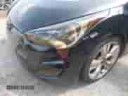 2013 Hyundai Veloster w/Black Int z VIN KMHTC6AD7DU154918, wystawiony jako IAAI lot #42902208 z przebiegiem 103 939 mil mil oraz . Historia ofert i sprzedaży dostępna na DreamBid. Obrazek 6.