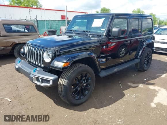 2022 Jeep Wrangler Unlimited Sahara z VIN 1C4JJXP69NW198960, wystawiony jako IAAI lot #42255807 z przebiegiem 23 789 mil mil oraz . Historia ofert i sprzedaży dostępna na DreamBid. Obrazek 2.